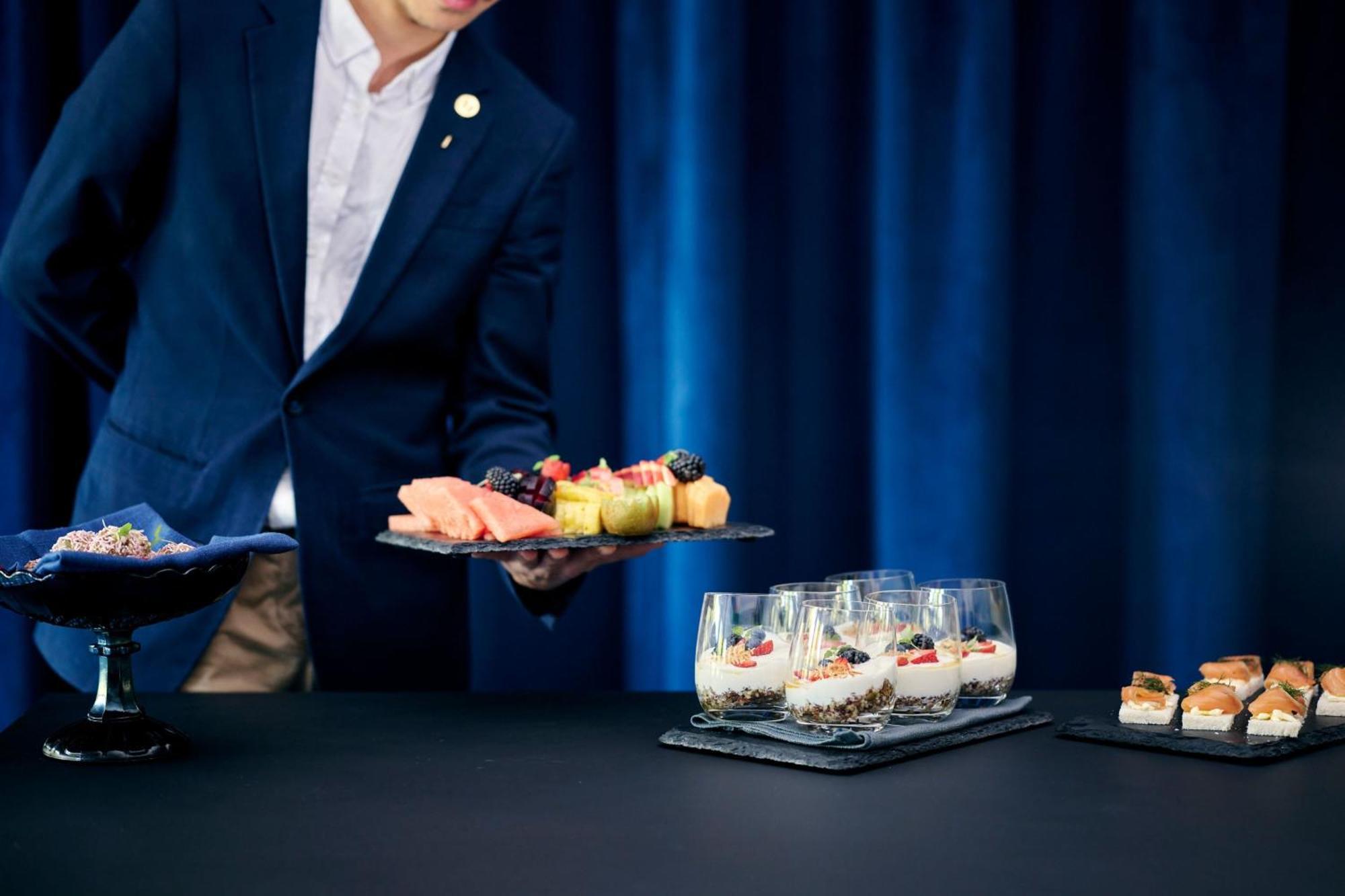 Midnight Hotel, Autograph Collection Canberra Exterior photo A butler serving food